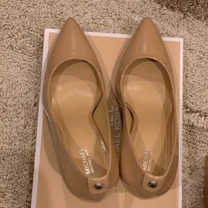 MK Flex Patent Leather Mid-Heel Pump. Nude color